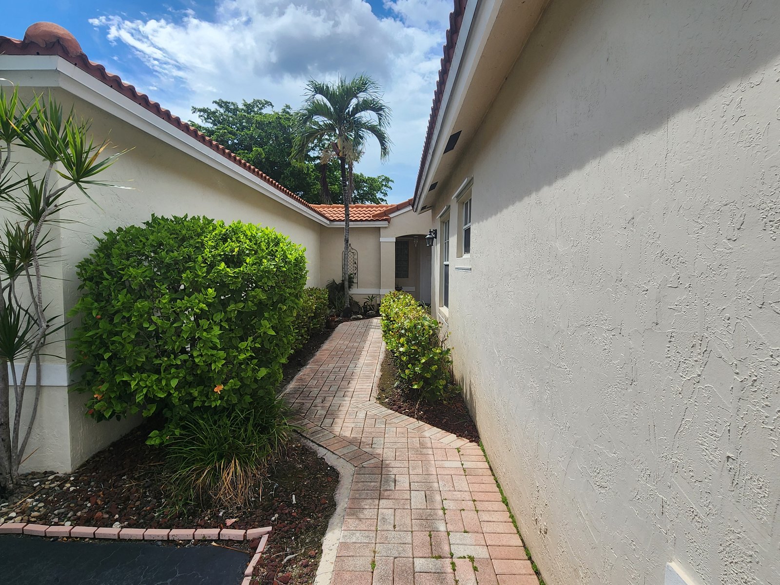 986 SW 180th Ter — Brick path along the side