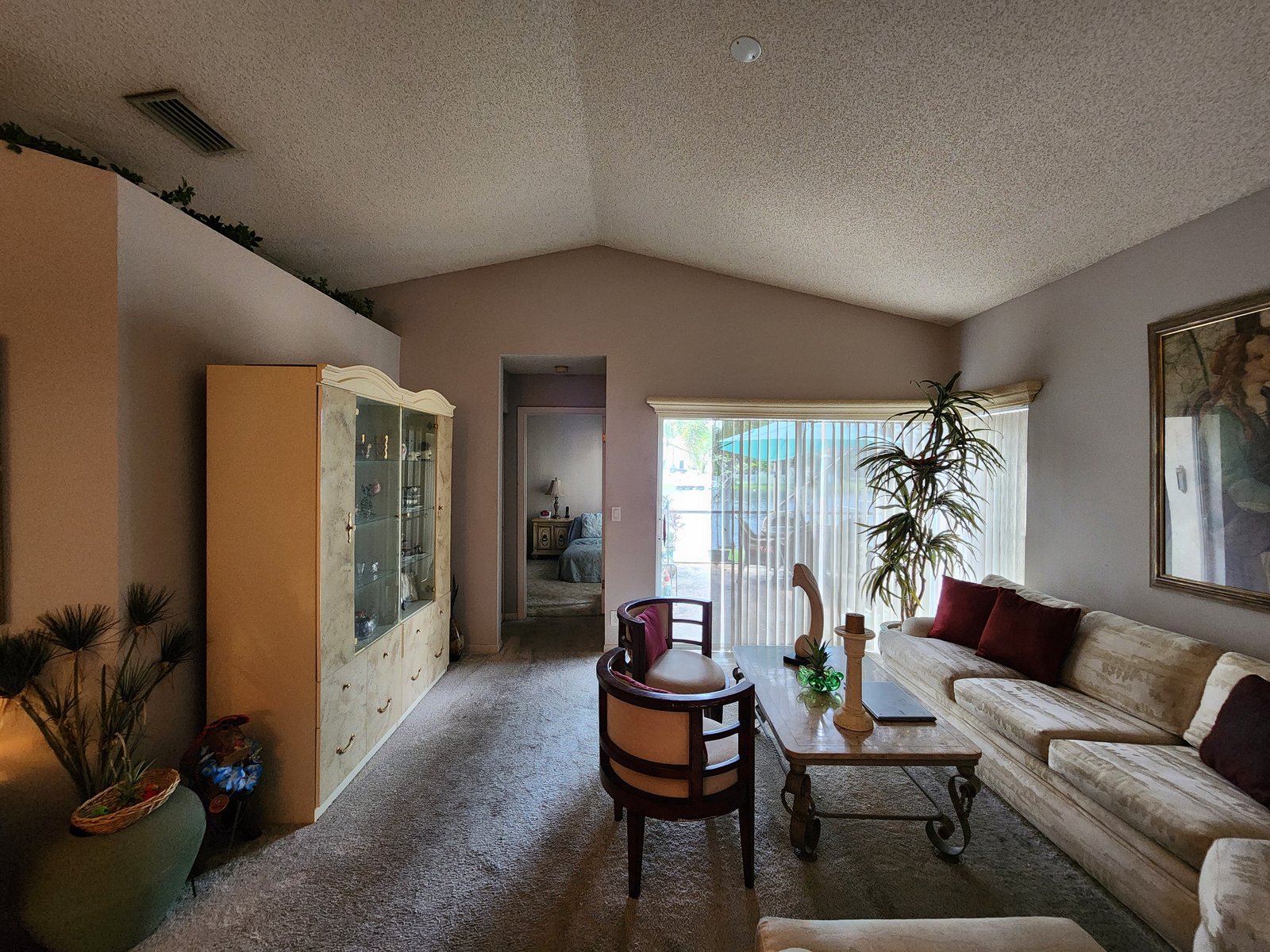 986 SW 180th Ter — Living room to the patio doors
