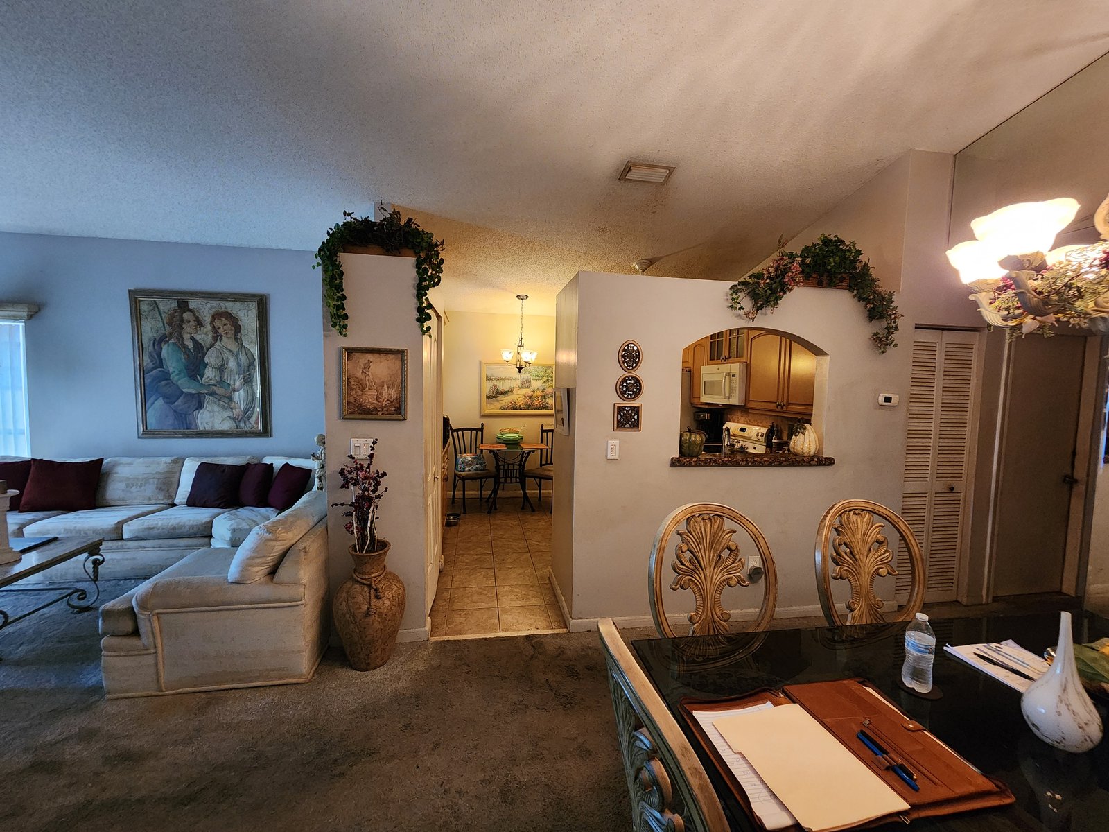 986 SW 180th Ter — Kitchen pass-through, from the dining table
