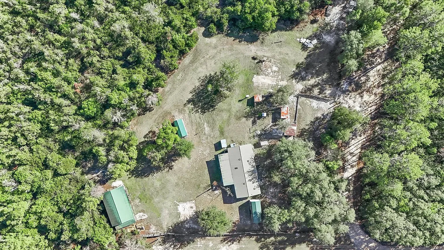 Aerial — home, hangar and outbuildings together