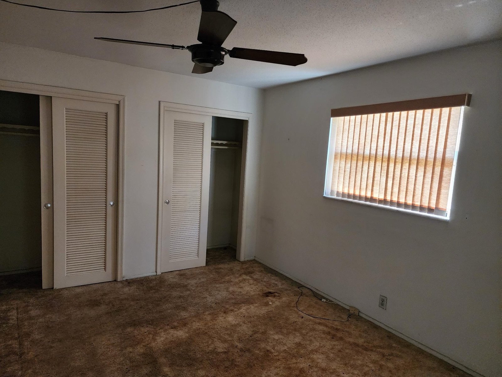 Bedroom one — double closets